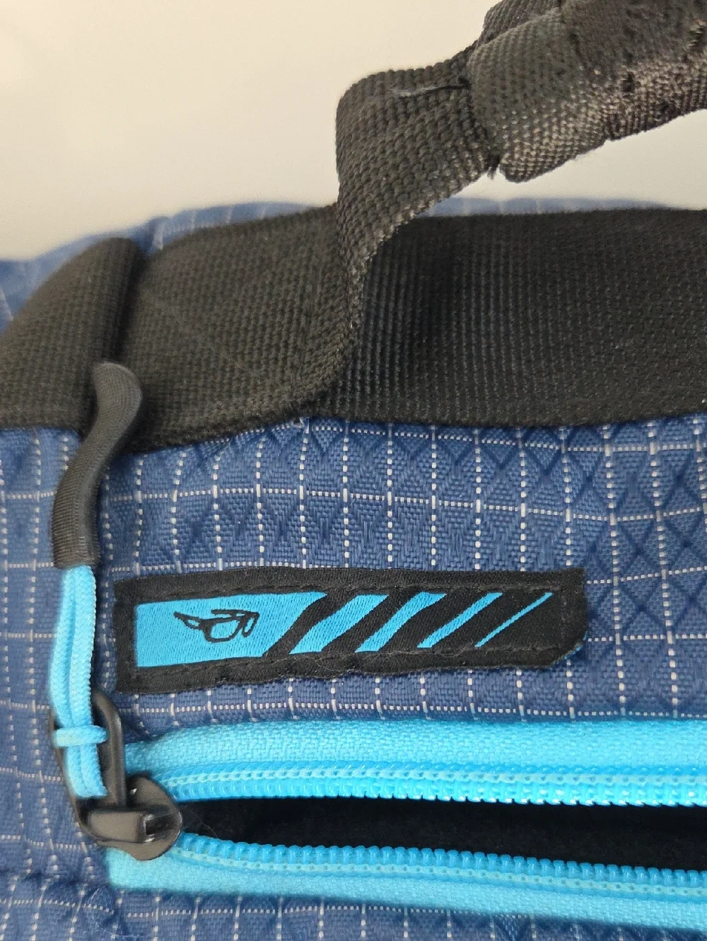 Oakley Link 35L Black and Blue Men's Duffel with Teal Logo